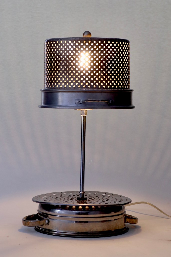 base of large soup colander is the shade and the colander lid is the base